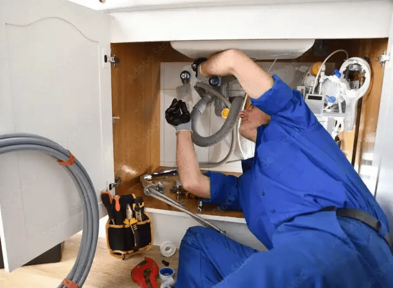 Plumbing repair under a bathroom basin